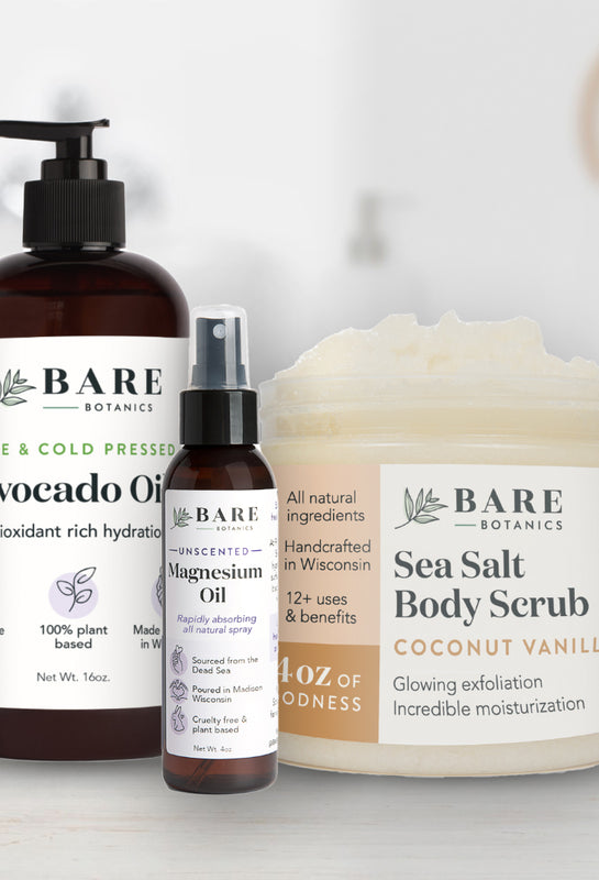 bare botanics best sellers on a counter avocado oil magnesium oil and coconut vanilla sea salt scrub